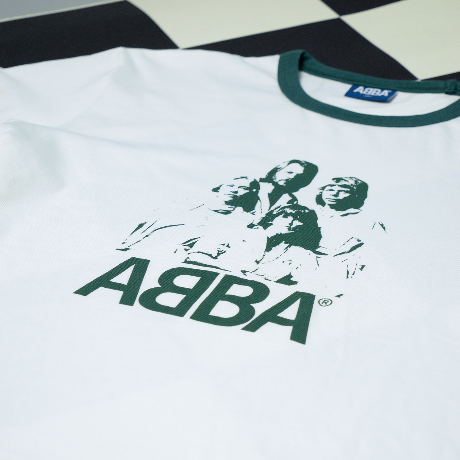 https://images.bravado.de/prod/product-assets/product-asset-data/abba/abba/products/509338/web/475927/image-thumb__475927__3000x3000_original/ABBA_ABBA-Ringer-T-shirt-Off-White-Green_T-Shirt_s509338_o5085468_a475927_v12226892.8dd385ce.png