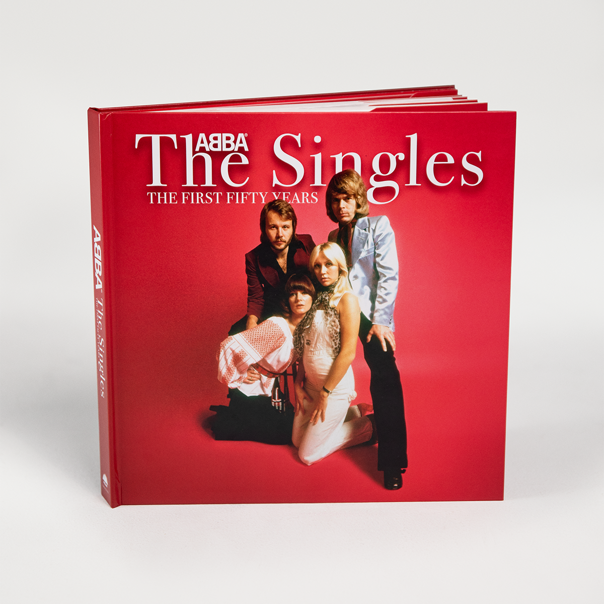 https://images.bravado.de/prod/product-assets/product-asset-data/abba/abba/products/509774/web/488263/image-thumb__488263__3000x3000_original/ABBA_The-Singles-The-First-Fifty-Years_4LP-Abba-Ringer-Tee_s509774_o5336979_a488263_v12302473.f919c640.png